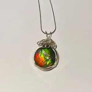Ammolite pendant amazing colours, Sterling Silver wire wrap