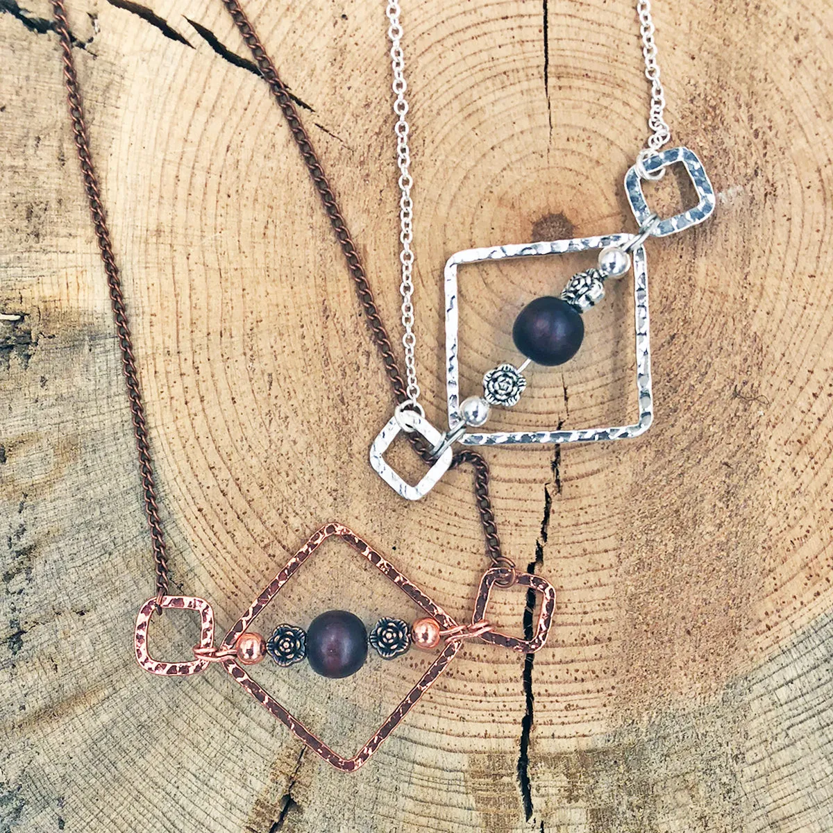 Geometric Necklace with Wood Bead and Metallic Floral Accents