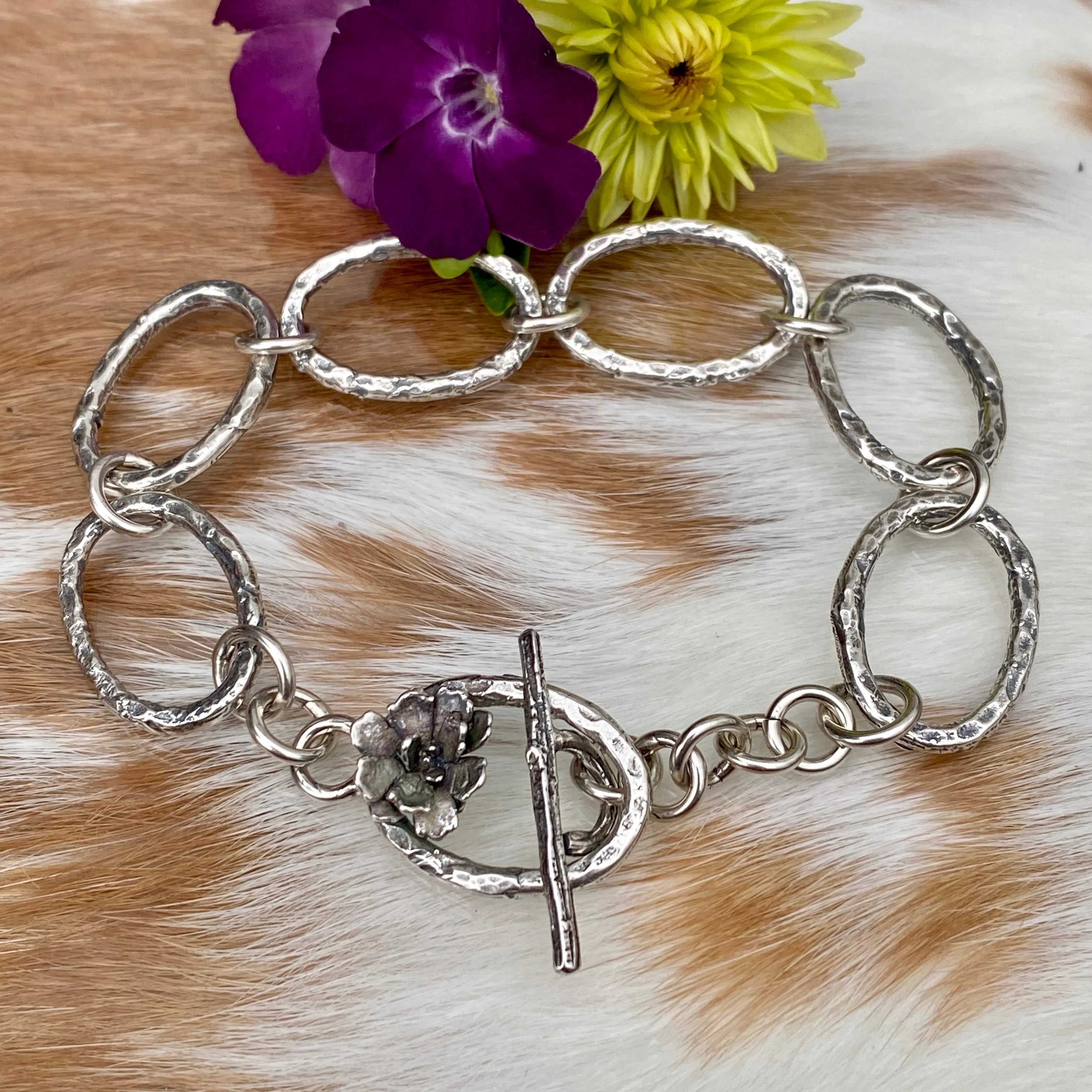Oval hammered hand cast sterling silver bracelet