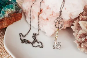 Rhinestone Wrapped Skeleton Key Necklace in Gunmetal